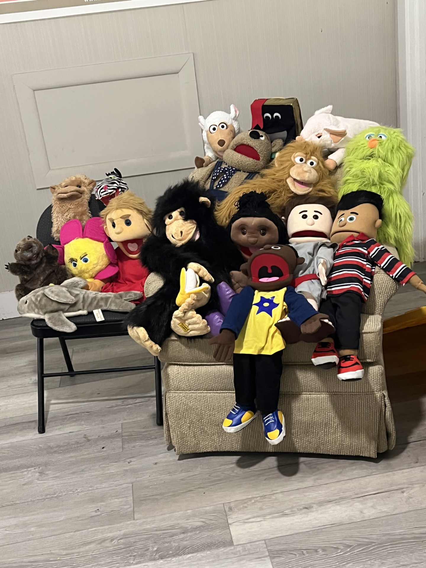 puppets in chair
